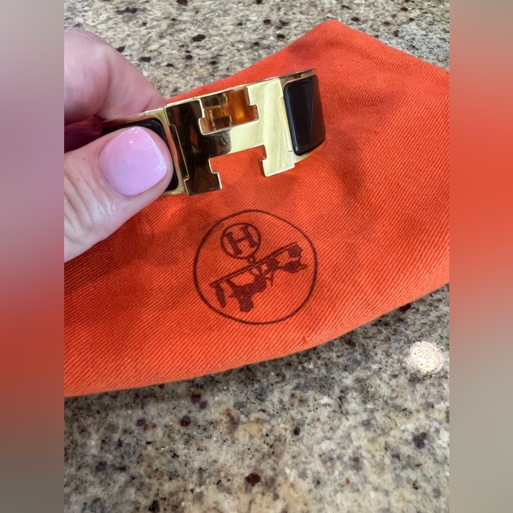 HERMES wide bracelet chocolate brown enamel with gold plated hardware.